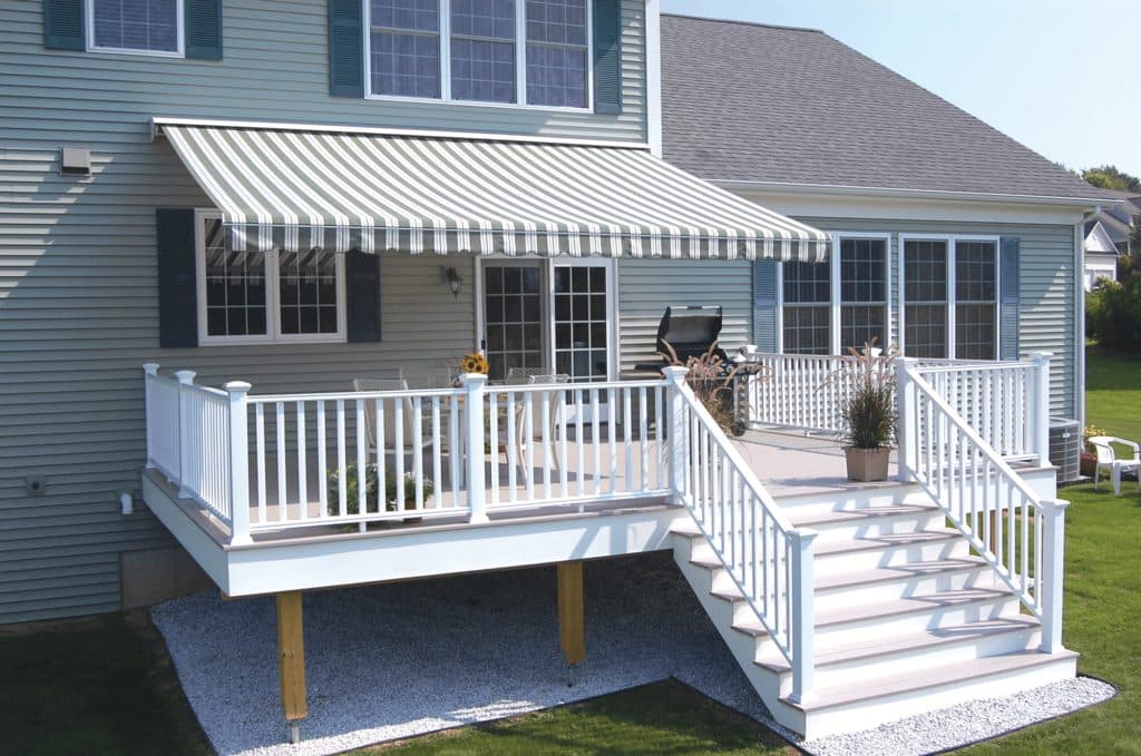 Exterior solar shade over a Long Island back patio