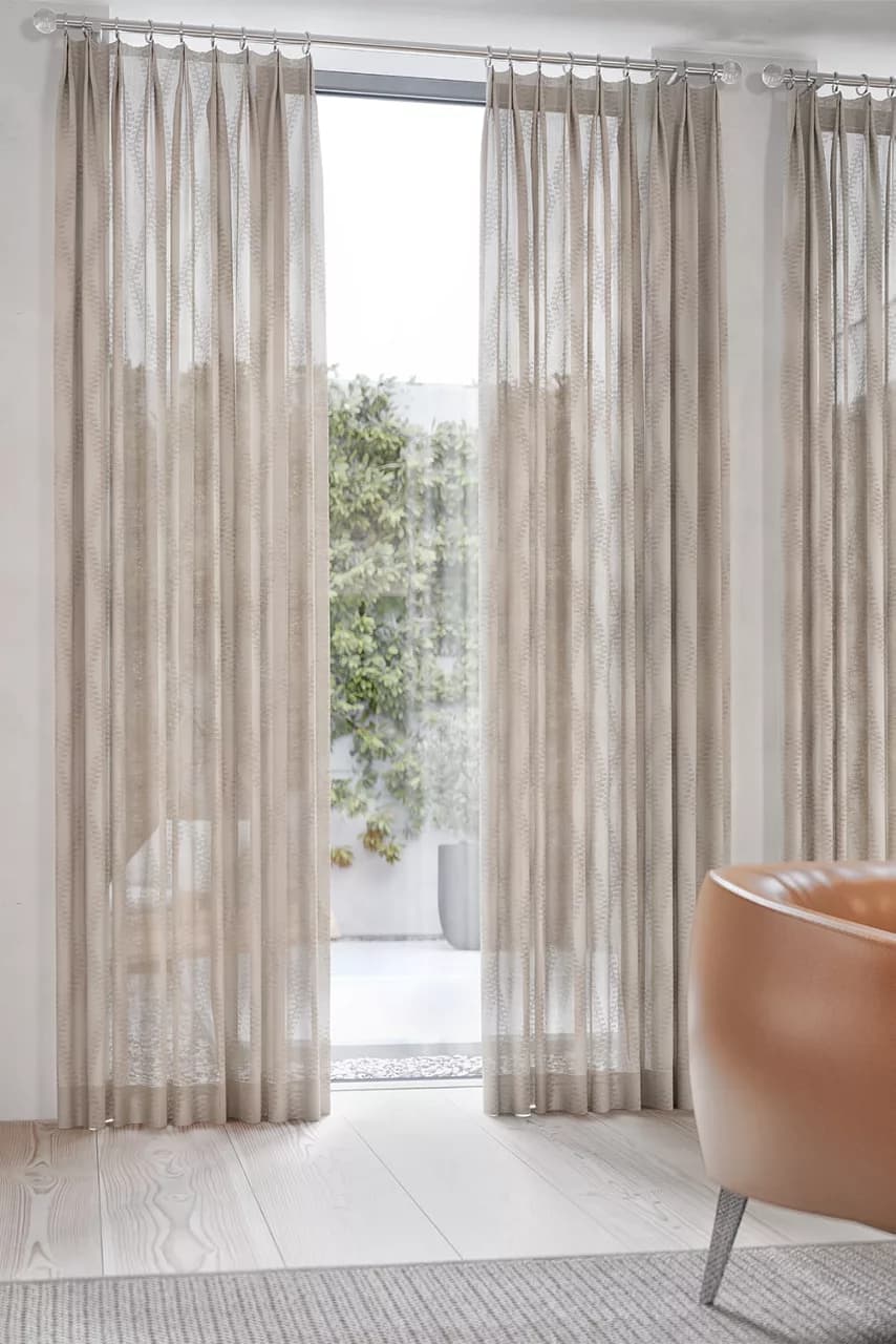 Olivia pleat drapery panels in Carole fabric